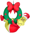 Green 4 ft Tall Inflatable Grinch Hanging from Wreath B303